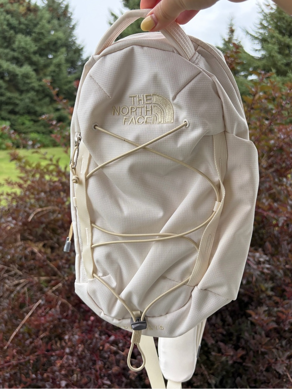 North Face borealis sling bag cream ivory mini backpack bag